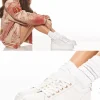 Damskie Carinii Skórzane Sneakersy Damskie | Na Platformie*Białe sneakersy na platformie --B9040-L46-000-000-000